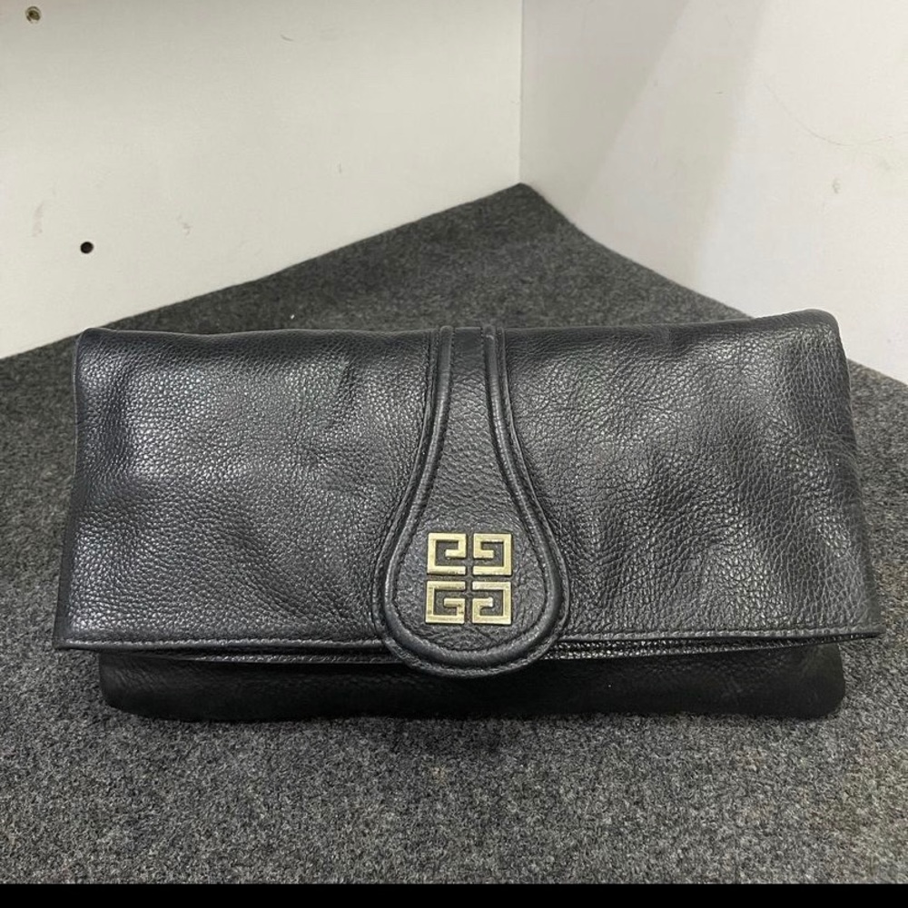 Gently used Givernchy flap fold over clutch leather Crossbody bag.